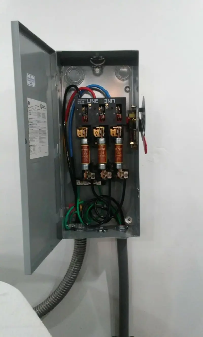 Three-phase disconnect switch installed for Smoke Detector Installation in Tuscola